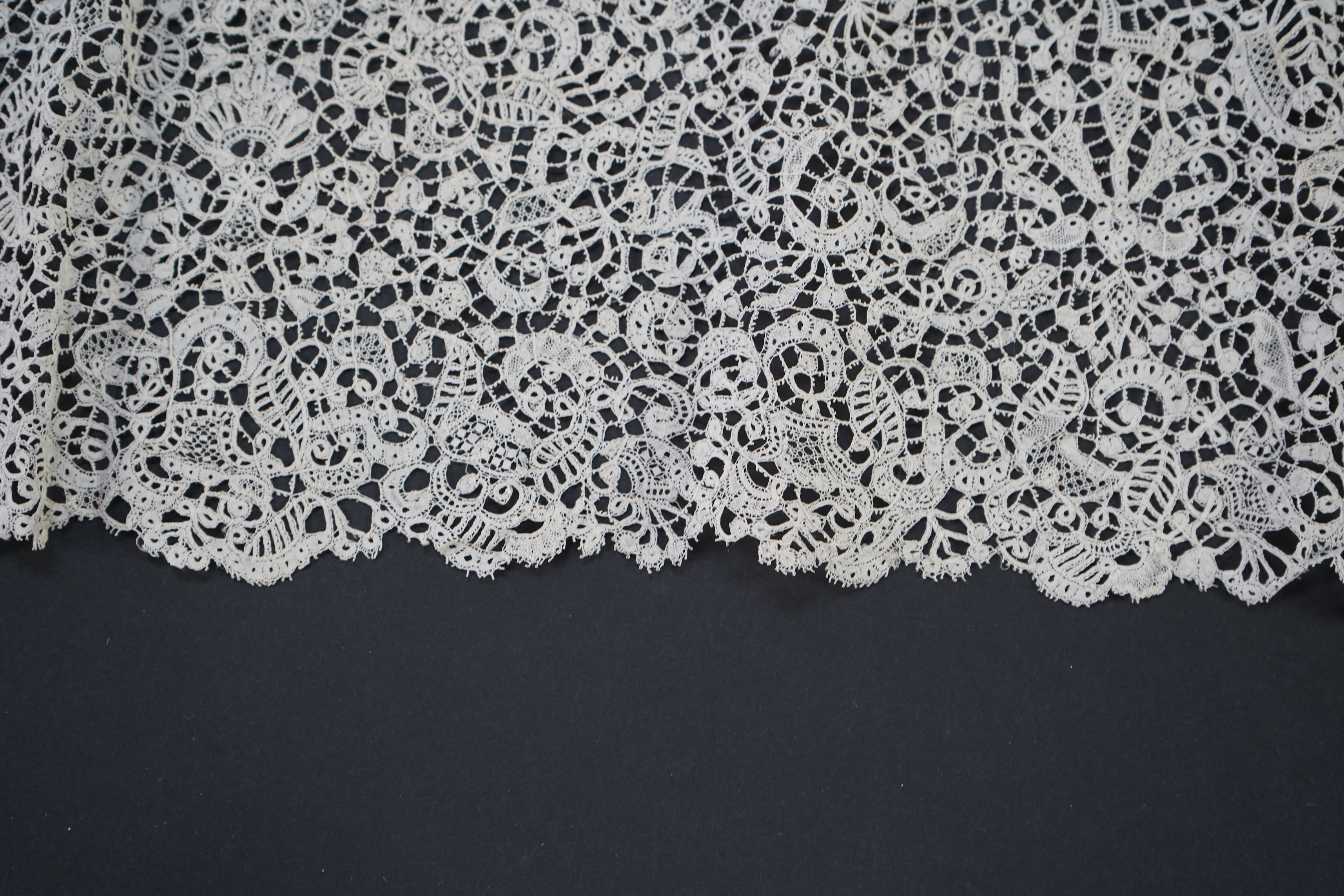 A rare late 17th century (1670-80) Flemish bobbin lace canopy possibly for a baby’s bercelonette (cradle), made for a wealthy European high ranking family, possibly royalty, worked in three sections, into a canopy shape,